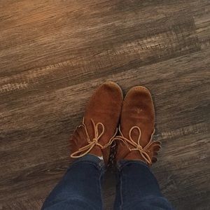 Tie, fringe moccasins